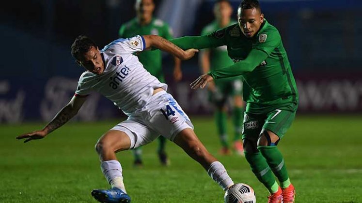 Jarlan Barrera (a la derecha), jugador de Atlético Nacional.