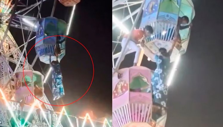 Mujer queda colgando de rueda de la fortuna
