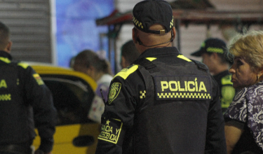 Policía Nacional atendiendo una escena del crimen.