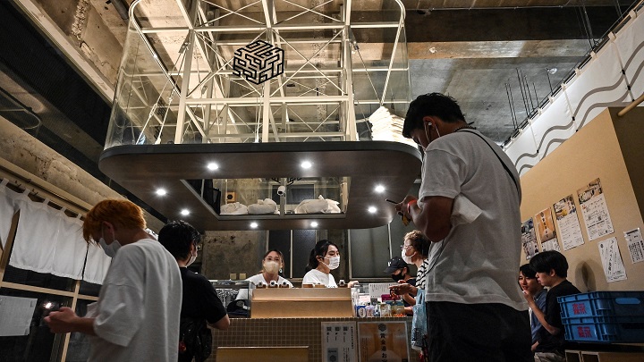 Baños públicos se reinventan para mantenerse a flote./Foto: AFP