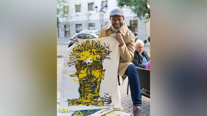 Baldot, el exboxeador que ahora pinta con sus puños./Foto: cortesía