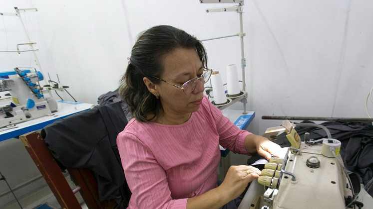 Sandra Mariño, retornada de Venezuela, encontró apoyo financiero para montar su microempresa./ Foto: Juan Pablo Cohen-La Opinión