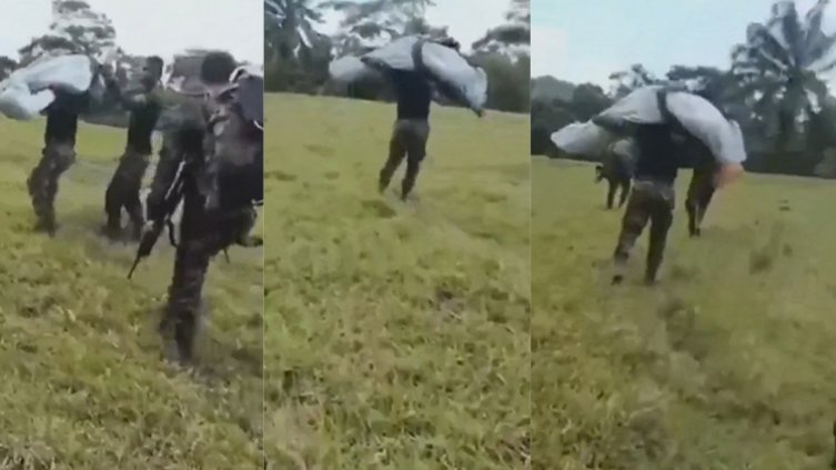 Soldado cargado por su compañero en Tibú