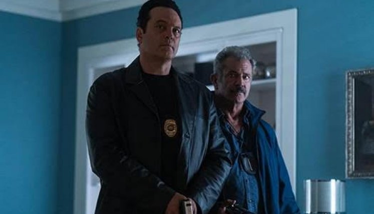 Dos policías particulares representan Vince Vaughn (izq) y Mel Gibson.