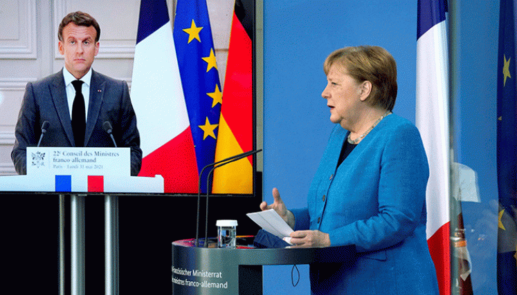 El presidente francés, Emmanuel Macron, y la canciller alemana, Ángela Merkel, exigieron explicaciones a Estados Unidos y Dinamarca sobre las acusaciones. / Foto AFP 