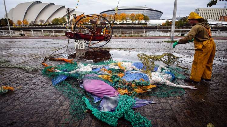 Acciones directas no violentas que está organizando el grupo de acción de activistas climáticos Extinction Rebellion en Glasgow Green./AFP