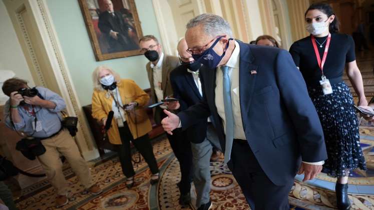 el líder demócrata del Senado, Chuck Schumer, anunció la "buena noticia" de un acuerdo entre las partes para subir el límite de endeudamiento./AFP