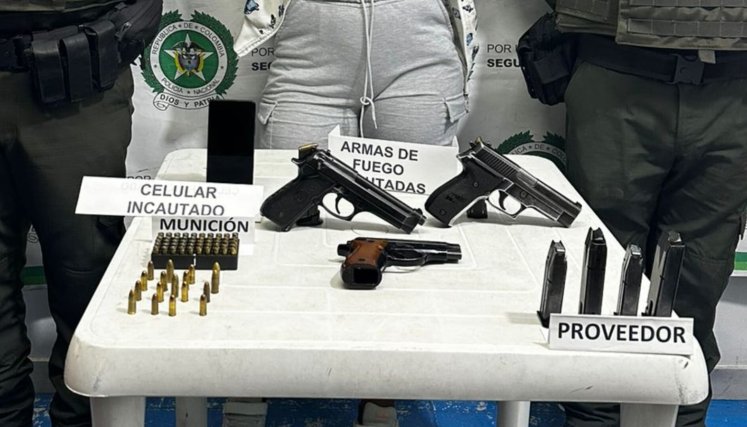 Capturada con armas de fuego