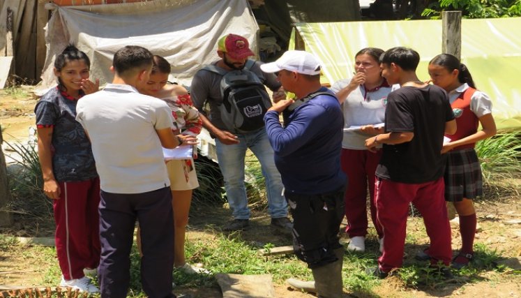Firmantes de paz de Hacarí trabajan en la adecuación de una granja experimental para resarcir el tejido social.