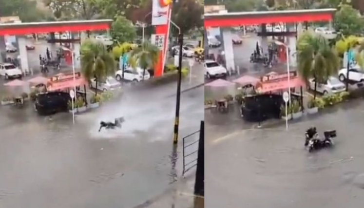 Moto cae en un hueco. 