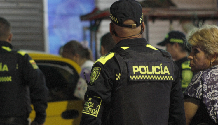 Policía Nacional atendiendo una escena del crimen.