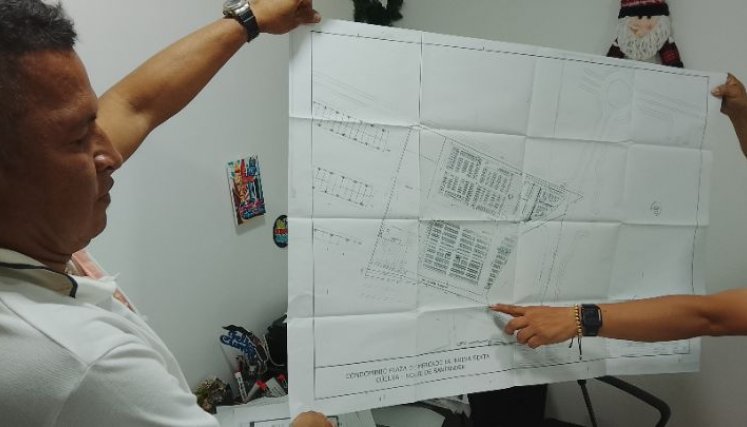 Líderes de la Nueva Sexta exhiben aquí un plano del lote de la polémica/Foto Orlando Carvajal