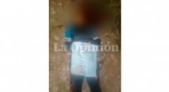 En el cuerpo del hombre sus asesinos le dejaron un cartel encima.