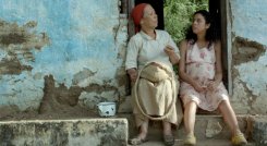 dos-mujeres-y-una-vaca