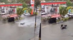Moto cae en un hueco. 