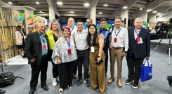Empresario de Norte en Caracas junto a la ministra de Turismo venezolana.png