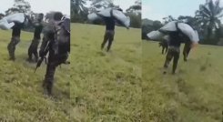 Soldado cargado por su compañero en Tibú