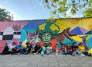 Jóvenes rescataron mural del Colegio Fe y Alegría en Los Patios.