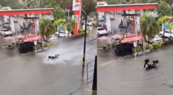 Moto cae en un hueco. 