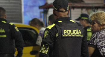 Policía Nacional atendiendo una escena del crimen.