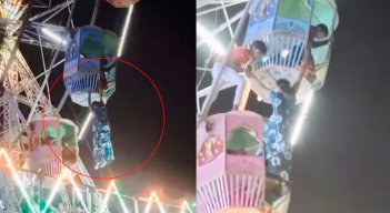 Mujer queda colgando de rueda de la fortuna