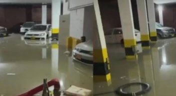 Dramático rescate: hombre casi se ahoga en parqueadero inundado por las lluvias